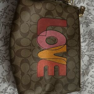 Coach Brown Signature Cosmetic Pouch with Red Pink Orange 'LOVE' Graphic